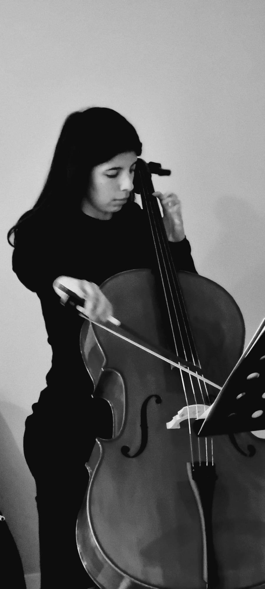 Luciana playing the cello